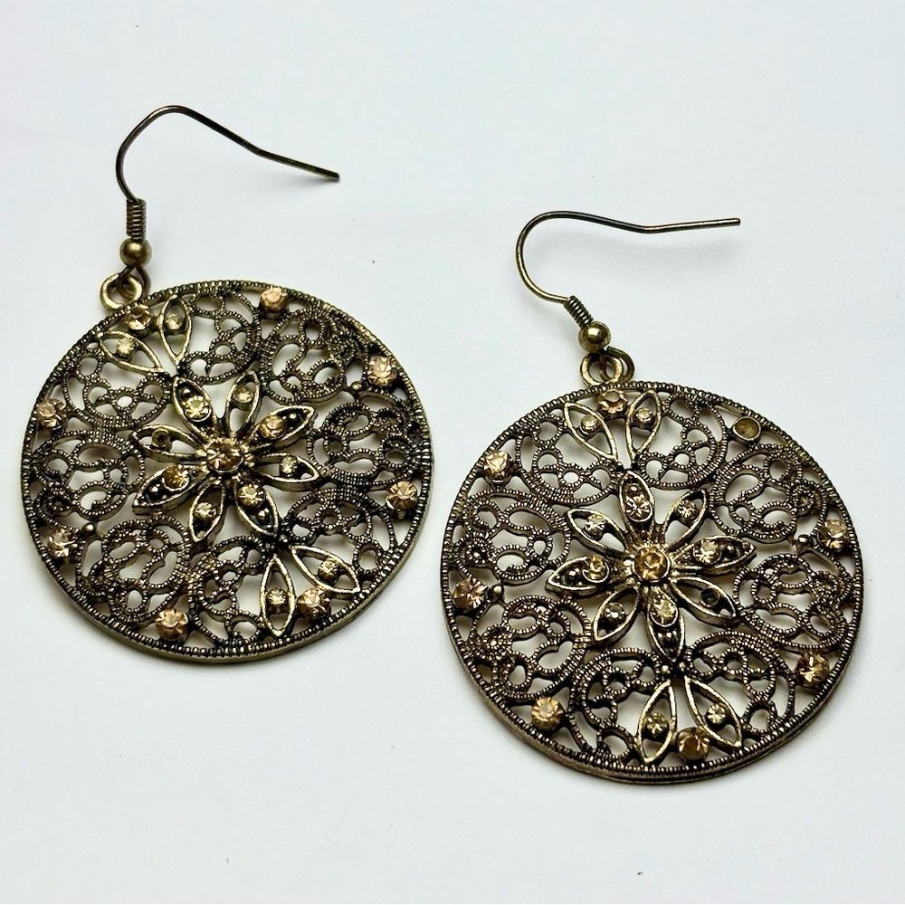 Vintage brass-tone filigree dangle earrings with rhinestones